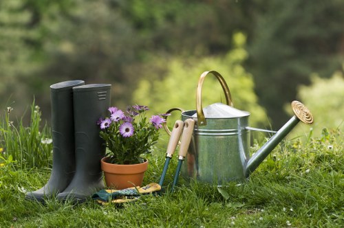 Recycling and composting materials during a sustainable garden maintenance job